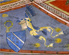 Le collier de la Cosse de genêt associé aux armoiries et la devise d'un des membres de la famille de Bernardo Cino dei Benvenuti (Bernard du Cygne), et renommée Nobili, anobli et gratifié d'une concession d'armoiries par Charles V, étendue par Charles VI. Palais communal de San Miniato. Le collier de la Cosse de genêt associé aux armoiries et la devise d'un des membres de la famille de Bernardo Cino dei Benvenuti (Bernard du Cygne), et renommée Nobili, anobli et gratifié d'une concession d'armoiries par Charles V, étendue par Charles VI. Palais communal de San Miniato.