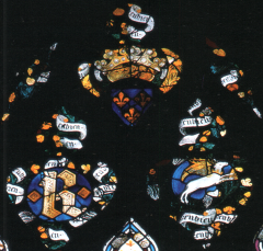 Partie haute du vitrail de la chapelle du Rosaire (baie 17) de la cathédrale d'Evreux. Le monogramme royal est associé aux armes, aux devises du cerf volant et du genêt et au mot EN BIEN (entre 1387 et 1390). Partie haute du vitrail de la chapelle du Rosaire (baie 17) de la cathédrale d'Evreux. Le monogramme royal est associé aux armes, aux devises du cerf volant et du genêt et au mot EN BIEN (entre 1387 et 1390). 